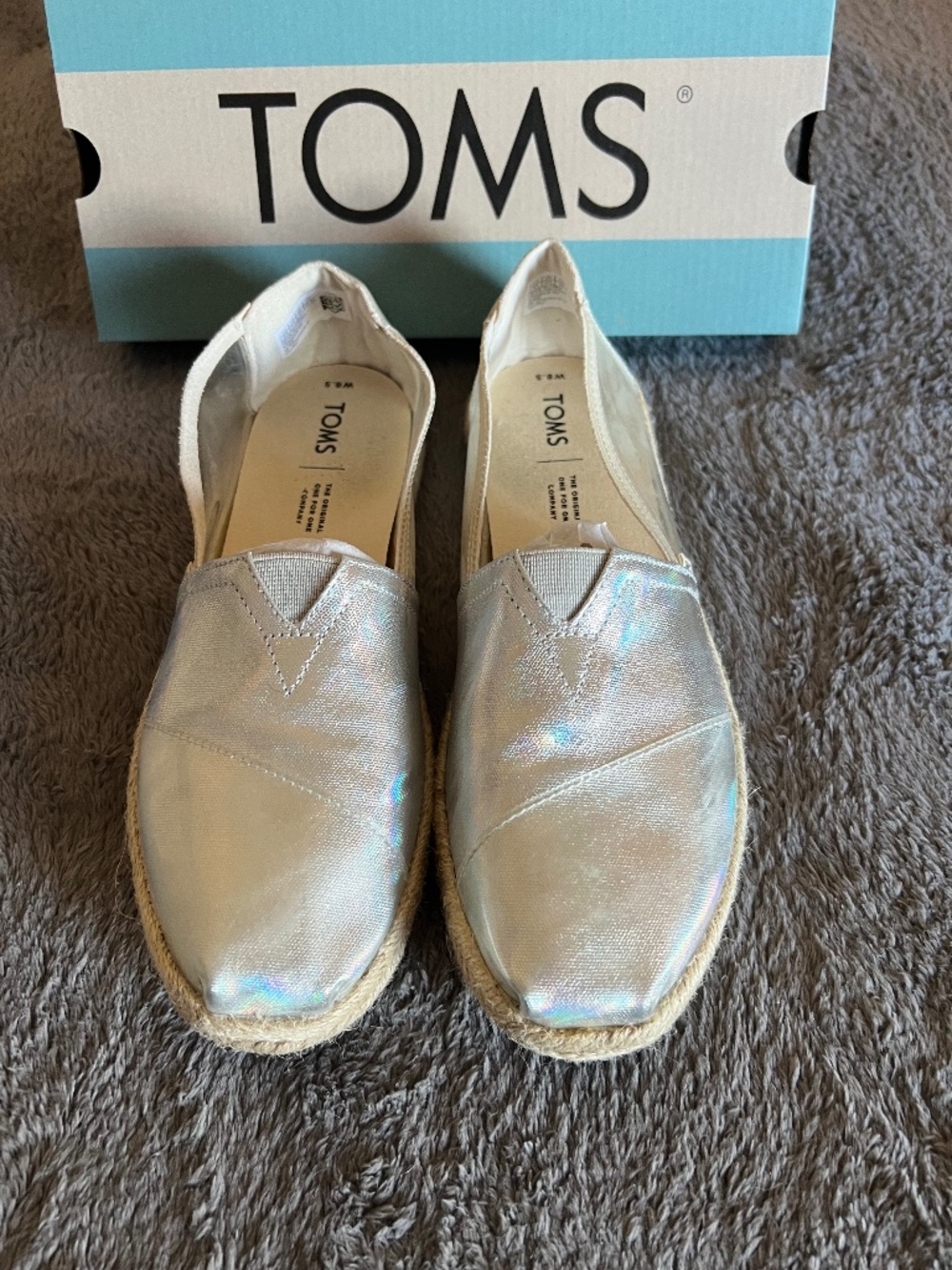 TOMS Women's size 8.5, Silver, Like New